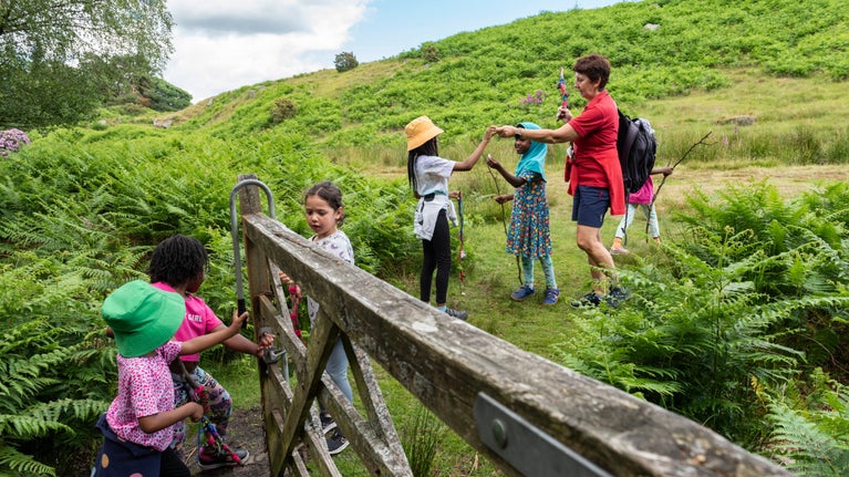Children on a 'Black Girls Hike' through the Longshaw Estate in the Peak District